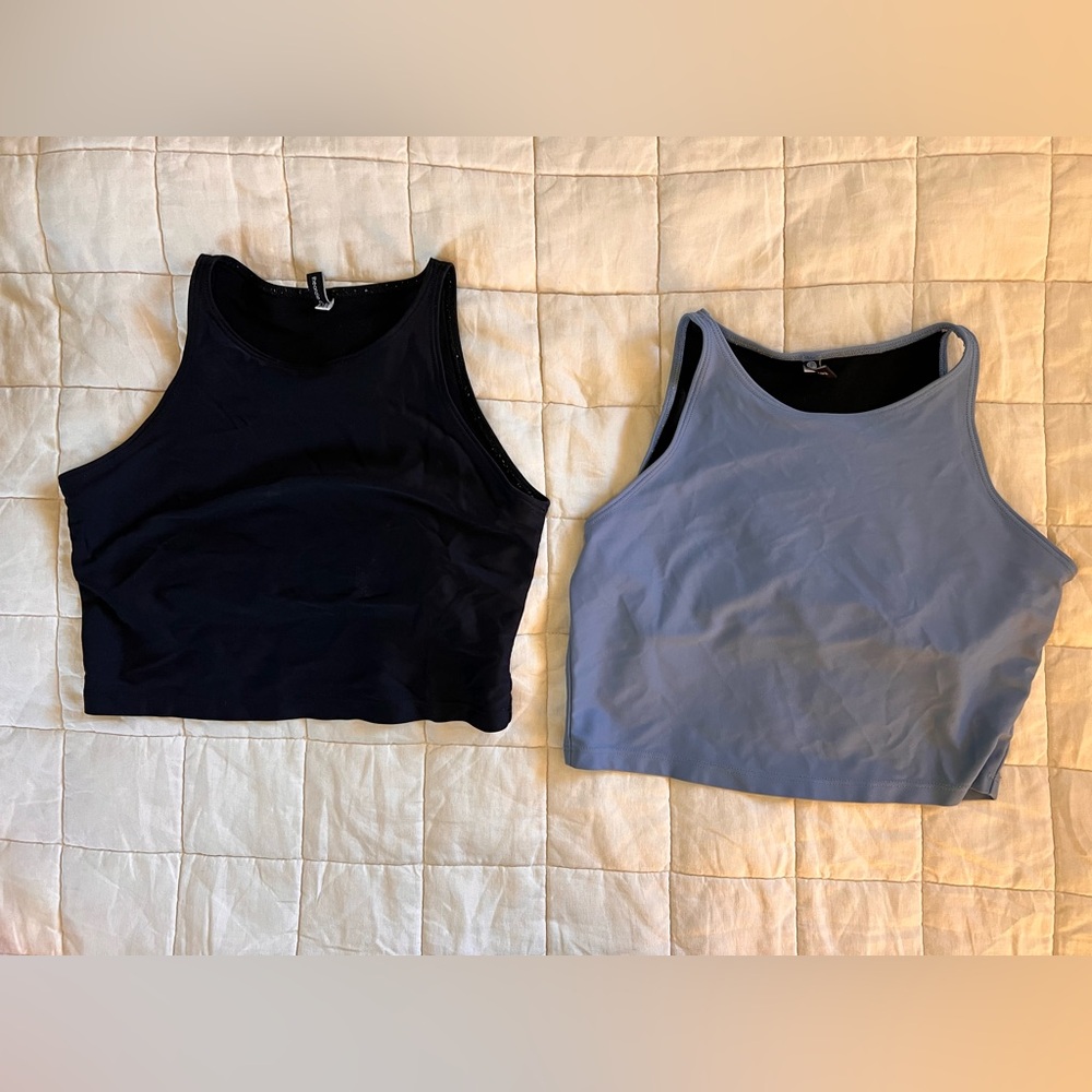 Two onzie crop yoga tanks, size medium/large